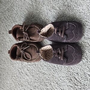 Two pairs of baby booties.